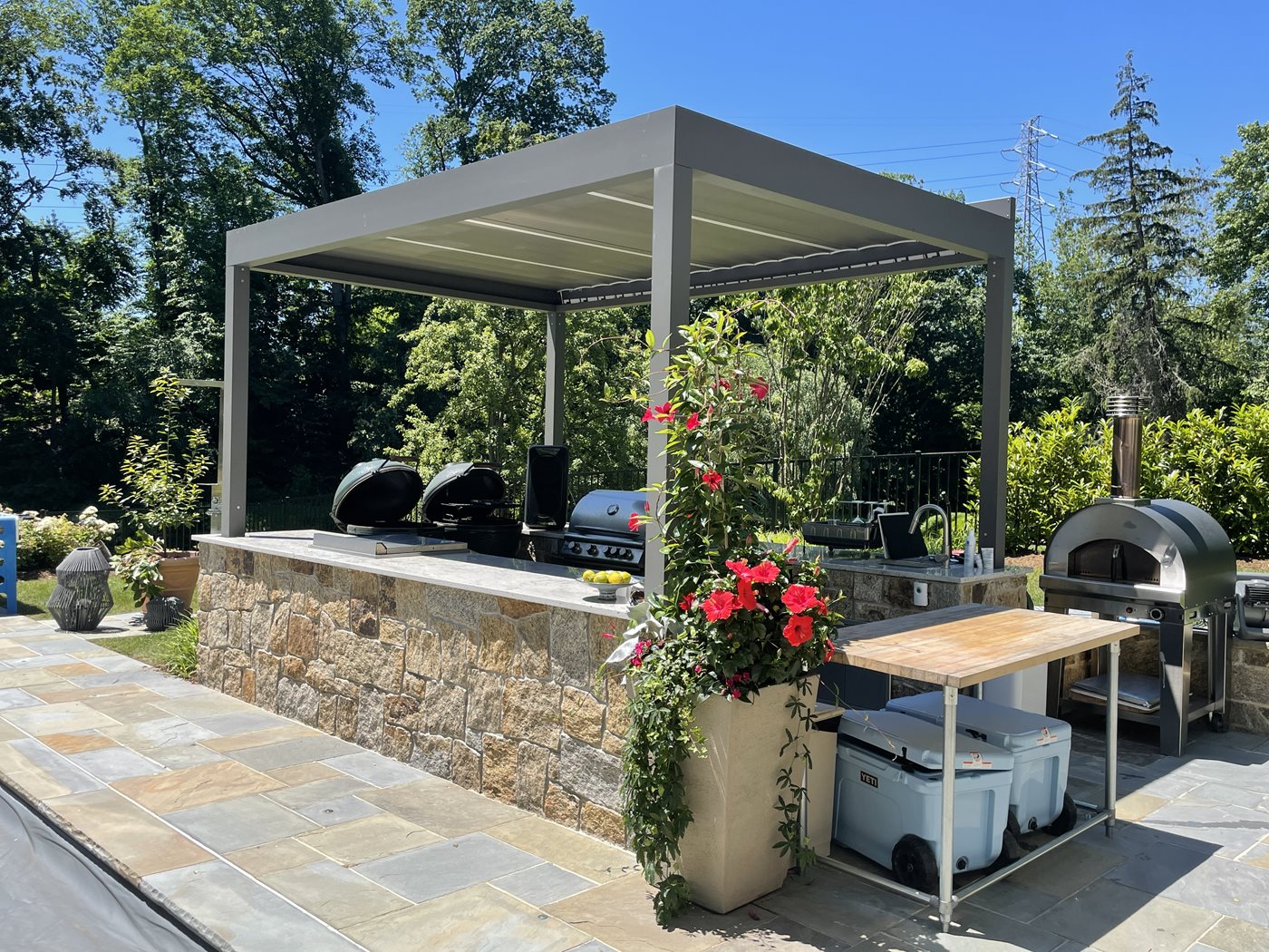 Alba-with-Short-Pillars-Mounted-Over-Outdoor-Kitchen-Area-by-New-Haven-Awning-(1).JPG
